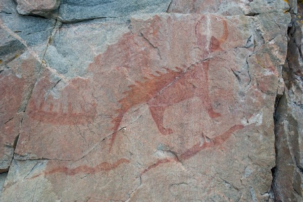 The feared "mishibizhiw" ("underwater night panther" in Ojibwe), a canoe full of people, and two giant serpents are some of the many Indian Petroglyphs at Agawa Rock.
