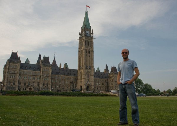 An American ambassador of good cheer awaiting entry into the Édifice du Centre of the Canadian Parliamentary complex, Ottawa