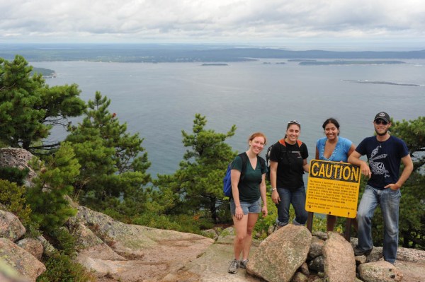 Brittany, Eugenia, Adri and I pose next to the "Caution: Climbing the Precipice may kill you!" sign. Brittany, Eugenia, Adri and I pose next to the "Caution: Climbing the Precipice may kill you!" sign.