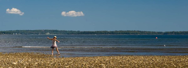 Kate wades in the waters of Penobscot Bay. Kate wades in the waters of Penobscot Bay.