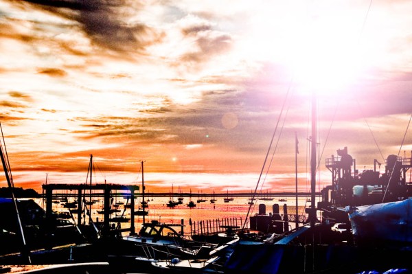 A portentous sunrise from the deck of Northern Cross over the Rockland Harbour, Knight Marine shipyard, and Vinalhaven ferry terminal. - Composite Image. A portentous sunrise from the deck of Northern Cross over the Rockland Harbour, Knight Marine shipyard, and Vinalhaven ferry terminal. - Composite Image.