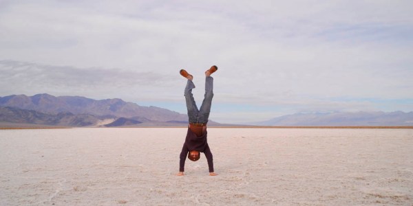 An extremely short lived handstand 286' below sea level on the salt beds of Death Valley. (Photo by Eugenia) An extremely short lived handstand 286' below sea level on the salt beds of Death Valley. (Photo by Eugenia)