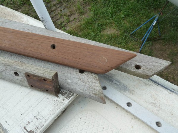 One of the four toe-rail sections sanded, three to go.