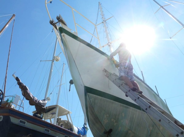 Working my way around the entire perimeter of the deck (over 90') with the grinder.
