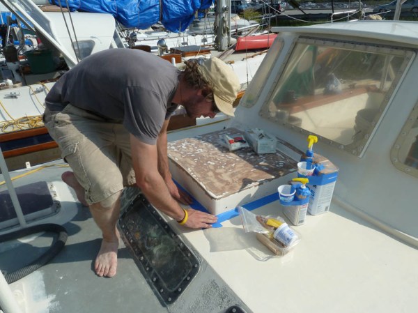 Jason masking the areas we hope to keep free of epoxy.