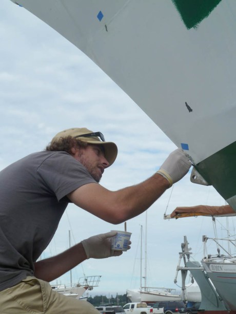 Jason epoxying areas of exposed steel.