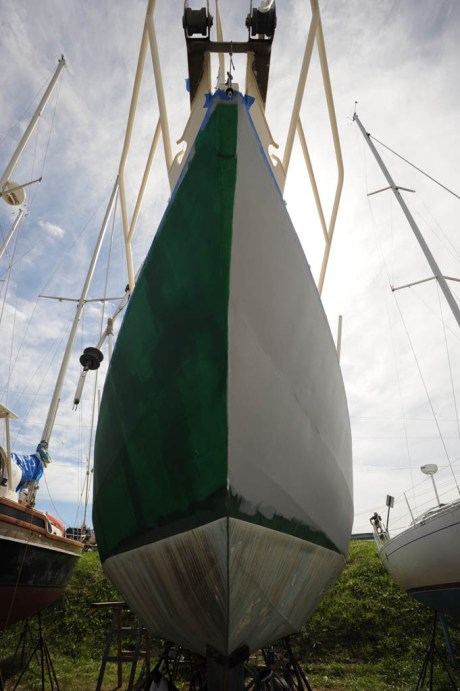 First coat of green on the starboard side. The cover was quite light and required three coats.