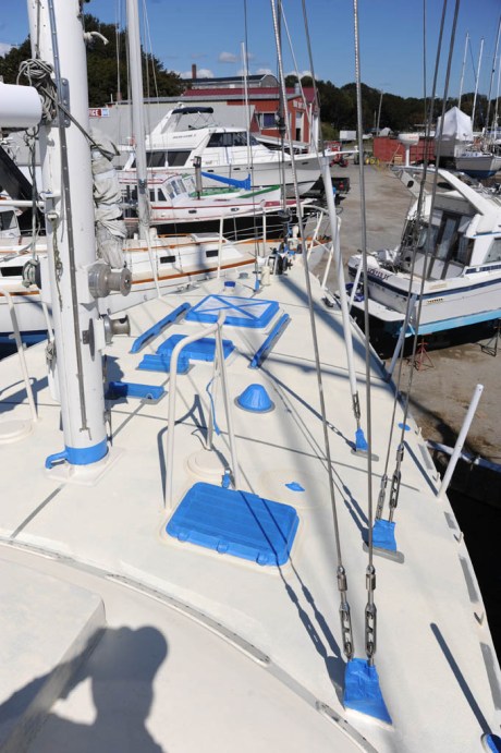 After the nonskid is painted over, an entirely new set of blue tape is applied to mask the areas which don't get top coated.