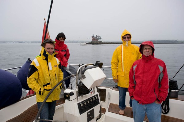 Anchor up and headed to sea. Nicolas, Santiago, Mom, and Dad passing the Rockland breakwater light.