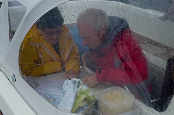 Mom and Dad navigating while enjoying some chips and home made Spicy Blue Cheese dip made minutes earlier in the galley.