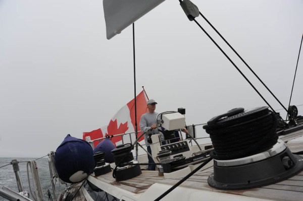 Dad sailing along at a pleasant 8 knots under full main and jib.