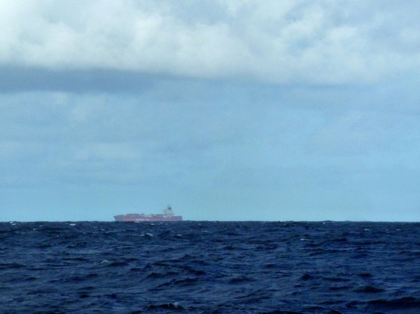 A container ship in the distance. A container ship in the distance.