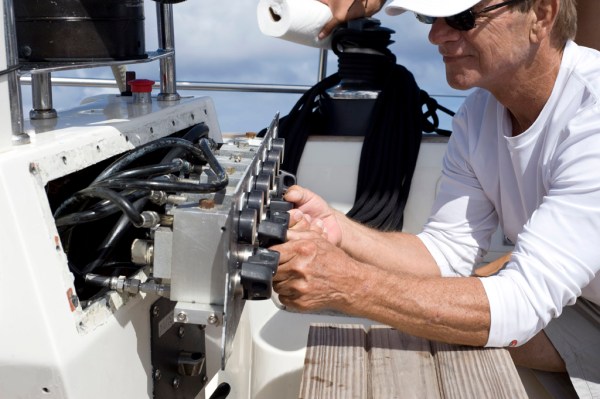 Gary helping fix the hydraulic system that runs the backstay, boom vang, outhaul, and various other heavily loaded things. Gary helping fix the hydraulic system that runs the backstay, boom vang, outhaul, and various other heavily loaded things.