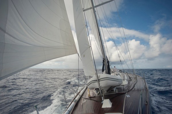 Flying a full main, staysail and jib. Flying a full main, staysail and jib.