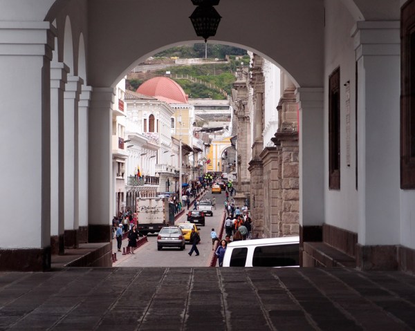 The streets of Quito through the entry hall of the Palacio de Gobierno. The streets of Quito through the entry hall of the Palacio de Gobierno.