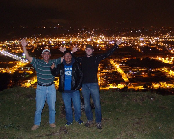 Elvia's husband Oswaldo, son Ivan and I pose high above the city lights of Latacunga. Elvia's husband Oswaldo, son Ivan and I pose high above the city lights of Latacunga.