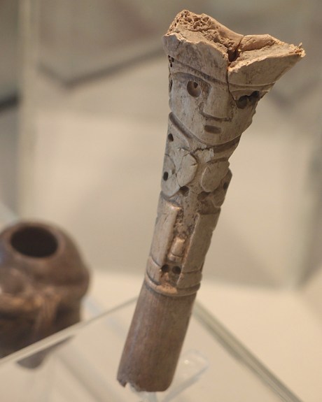 A snuffing tube made from human bone.