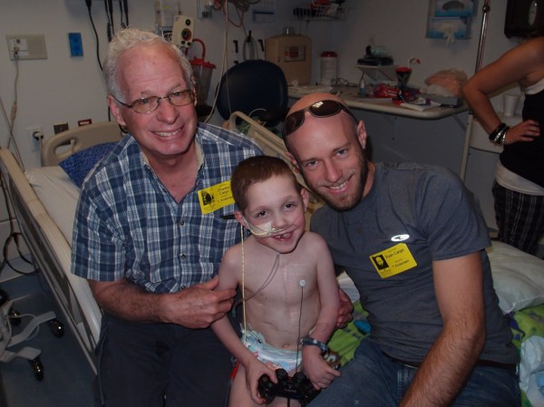 Dad and I with the toughest, smilingest guy you could ever meet.
