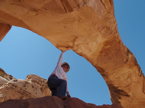 Mom single-handedly holding up the Hickman Bridge.