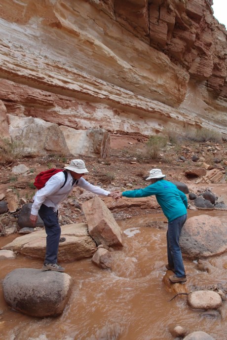 Mom and Dad crossing Sulphur Creek, practice for the waterfalls we'd soon climb.