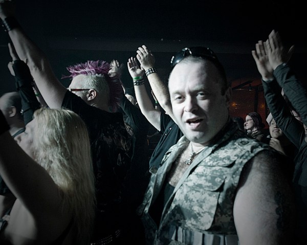 Russian friends Ioann and Natasha rock out to Ioann's favorite band, FGFC820.