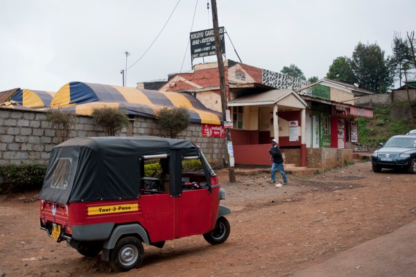 A 3-wheeled tuktuk taxi in the suburbs of Nairobi.