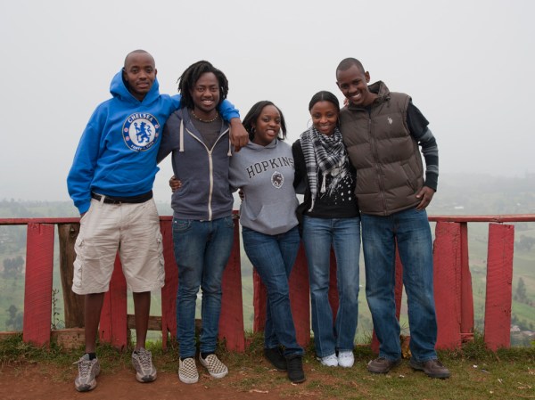 Ben, Victor, Christine, Eve, and Brian pose above the fogged in Rift Valley.