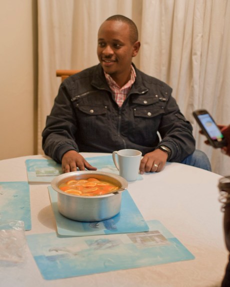 Brian's brother-in-law ponders Gachanja's powerful orange drink.