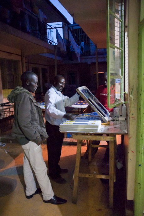 Picking up the wedding programs from screen the printing shop.