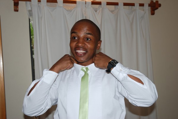 Gachanja enjoying a little practical joke called "Let's steal Ryan's shirt!" - Photo by JoeLink Media