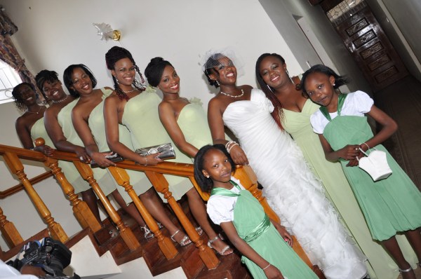 Bridesmaids Victoria, Rachel, Ngonyo, Deyonka, Eve, and Angela with Christine and the flower girls. - Photo by JoeLink Media