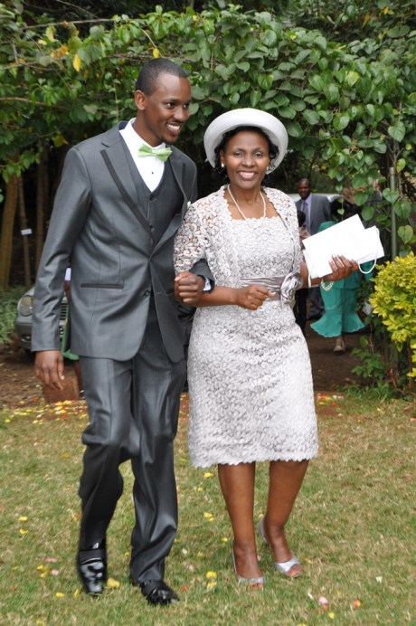 Brian walking Maito to her seat. - Photo by JoeLink Media