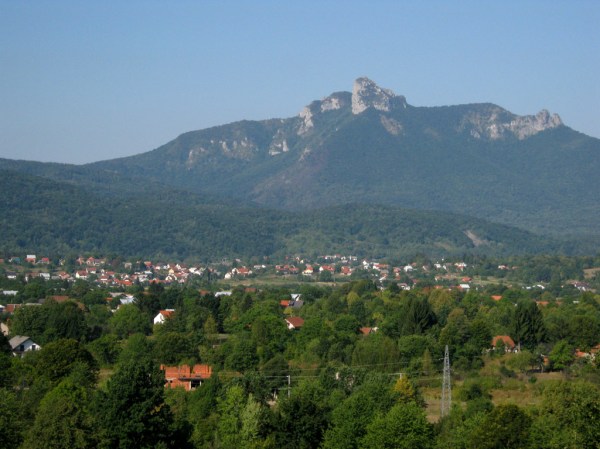 The next morning I felt better (that's a lie), but Punda Milia didn't seem the slightest bit discouraged so what else could I do but ride on? Here, Mount Klek rises behind the town of Ogulin.