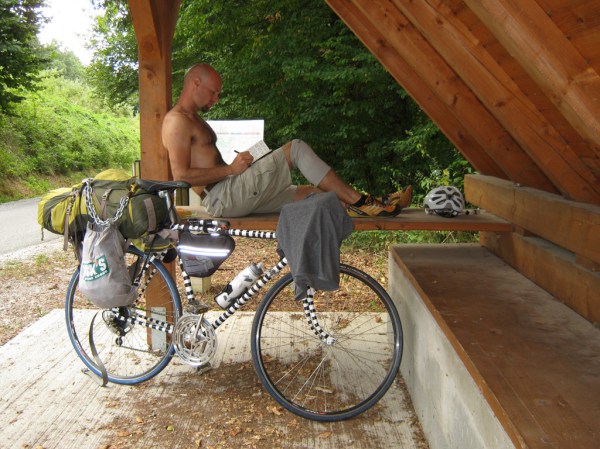 Catching up on some writing while resting along the Drava River, Slovenia.