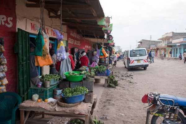 Getting produce and fresh meat for dinner at a Naro Moru market.