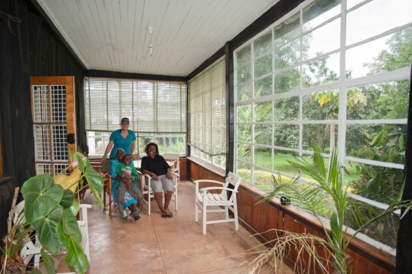 Eugenia, Shosho, Freddy and Maito relax in the sunroom before we tour the estate.