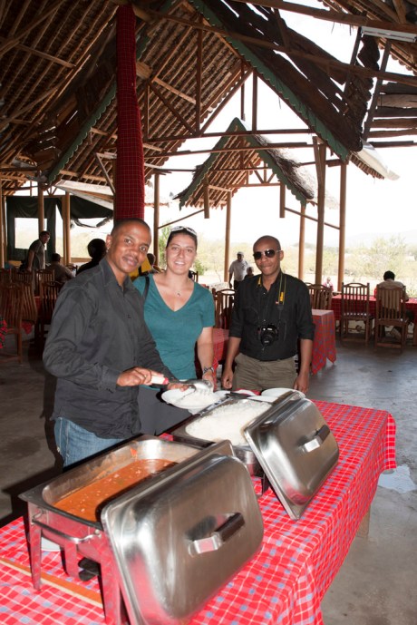 Gachanja, Eugenia and Charles getting dinner back at camp.