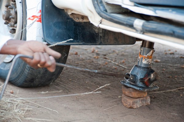 Not ideal tire changing conditions, but somehow we managed it fairly quickly. Apparently a nearby hungry lion nearby is great motivation!