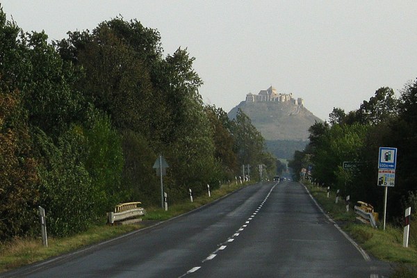 Sümeg Castle rises in the distance.